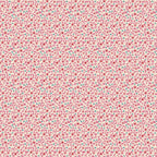 patterned fabric with small pink flowers and teal dots